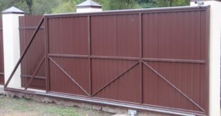 Купить откатные ворота из профнастила Мыски, цена от 1786 руб.