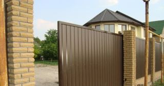 Купить откатные ворота из профнастила Мыски, цена от 1786 руб.